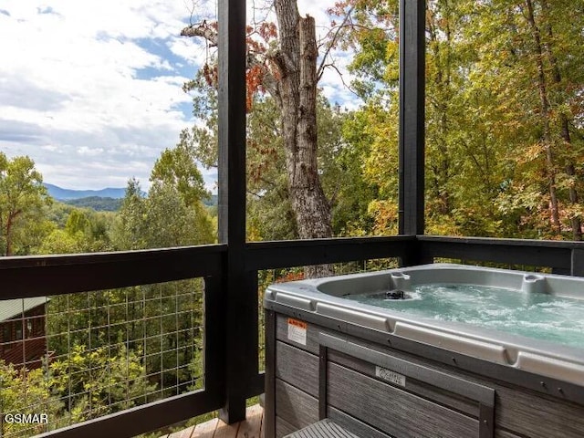 2434 Breezy Rd, Sevierville, TN 37876 - wooden terrace with a hot tub