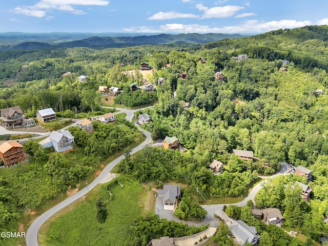 730 Deerfoot Dr, Gatlinburg, TN 37738 - drone / aerial view of a heavily wooded area and a mountainous background