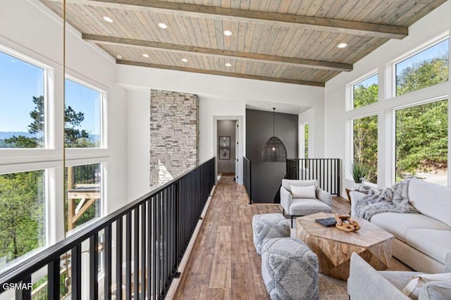 937 Autumn Ridge Way, Sevierville, TN 37876 - living room featuring wooden ceiling with exposed beams, hardwood / wood-style floors, healthy amount of natural light, a towering ceiling, and recessed lighting