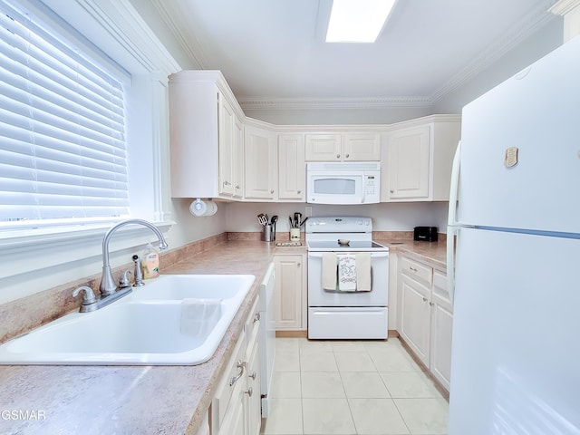 kitchen featuring sink, white appliances, light tile patterned floors, white cabinetry, and ornamental molding