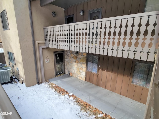 entrance to property featuring central AC