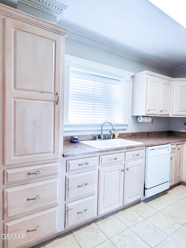 kitchen with light tile patterned flooring, white dishwasher, sink, and crown molding