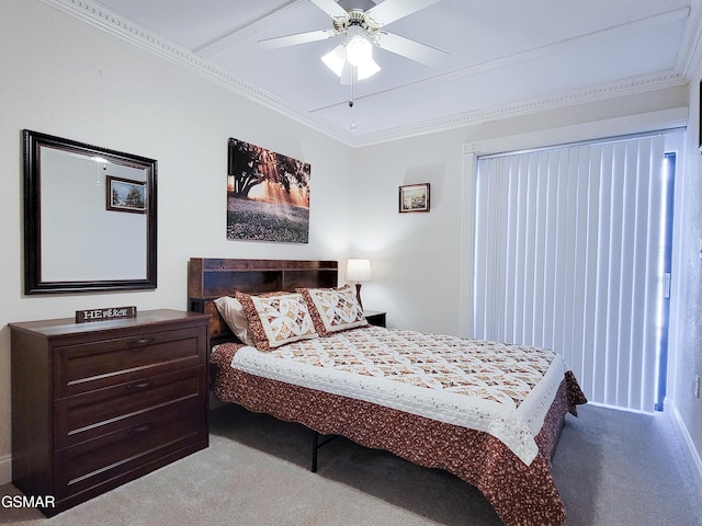 bedroom with crown molding, light carpet, and ceiling fan