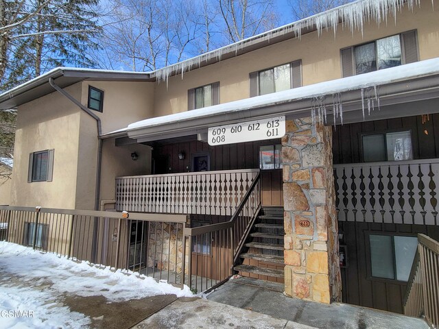 view of snow covered property