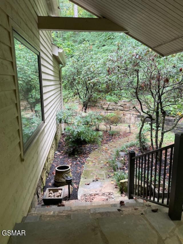 view of patio featuring a porch