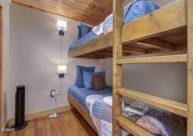 125 Cricket Hollow Way, Cosby, TN 37722 - bedroom with wood finished floors and wooden ceiling