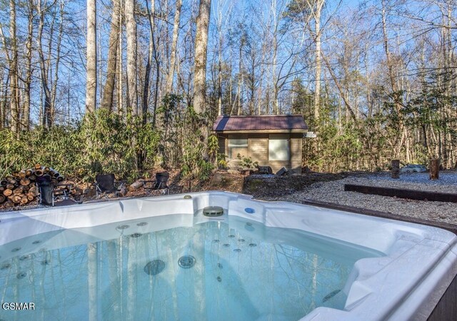 125 Cricket Hollow Way, Cosby, TN 37722 - view of pool featuring a hot tub and an outdoor structure