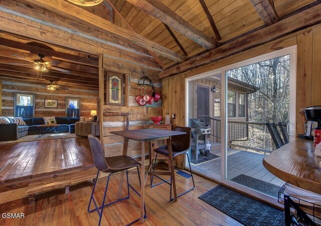 125 Cricket Hollow Way, Cosby, TN 37722 - dining space with hardwood / wood-style floors, wood walls, wooden ceiling, and a ceiling fan
