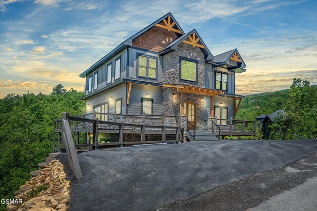 view of front facade featuring a wooden deck