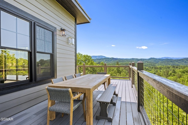 wooden terrace featuring a mountain view