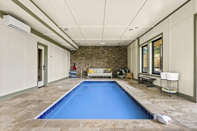 view of swimming pool featuring a wall mounted AC