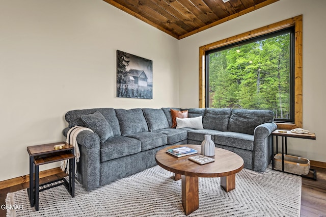 living room with hardwood / wood-style flooring and wooden ceiling