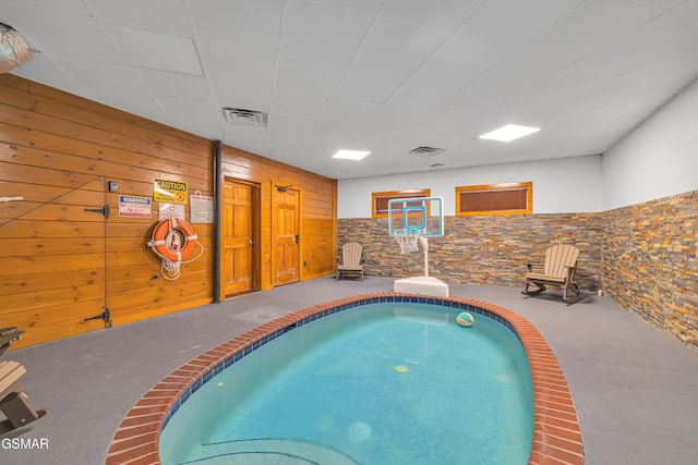 view of pool featuring a hot tub