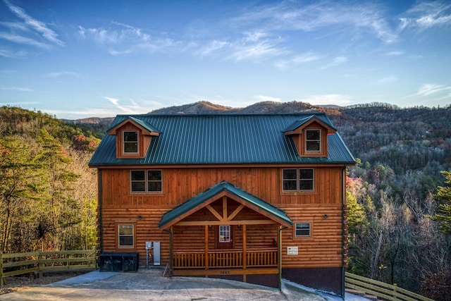 exterior space featuring a mountain view