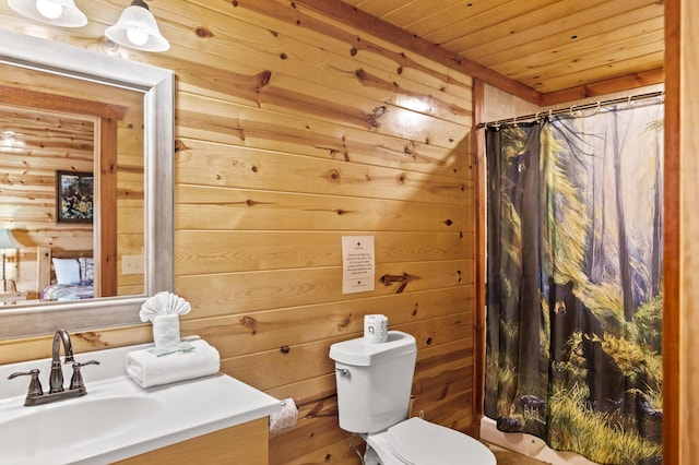 bathroom with wood ceiling, a shower with curtain, vanity, toilet, and wood walls