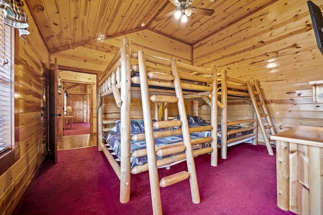 unfurnished bedroom featuring dark carpet, wooden ceiling, rustic walls, and vaulted ceiling