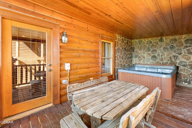 deck featuring a hot tub