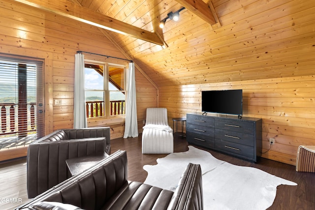 sitting room with wood ceiling, vaulted ceiling with beams, and wooden walls