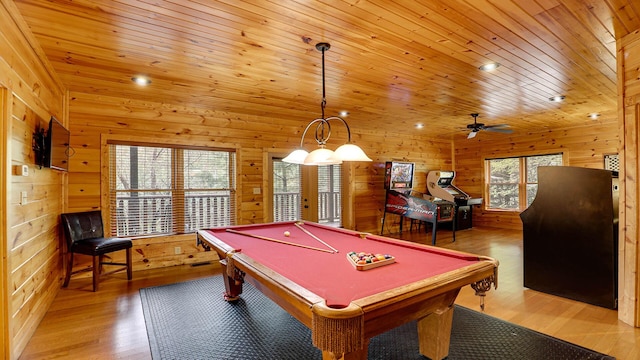 rec room featuring wood walls, wooden ceiling, billiards, ceiling fan, and wood-type flooring