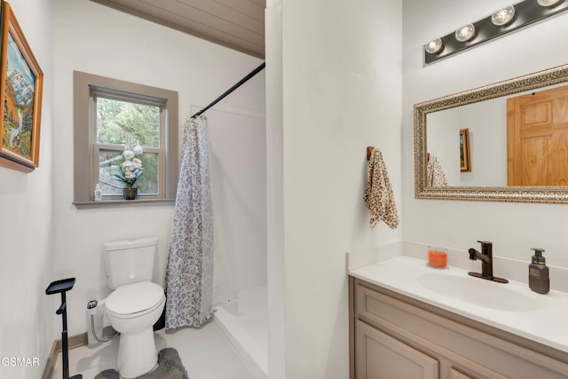 bathroom with walk in shower, vanity, and toilet