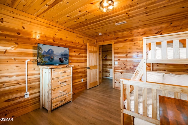 bedroom with wood-type flooring and wood ceiling