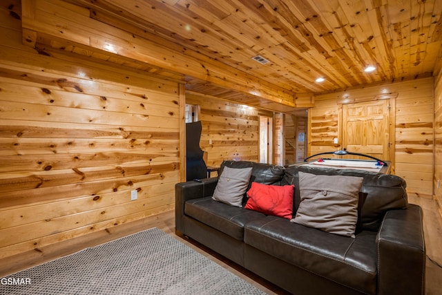 interior space with wooden ceiling and wooden walls