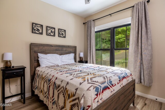 bedroom featuring wood-type flooring