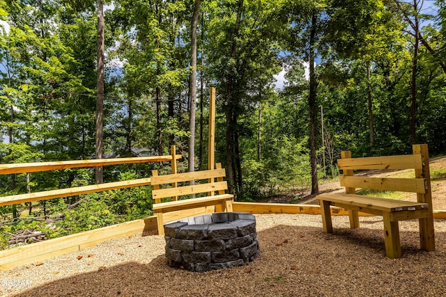 exterior space with an outdoor fire pit