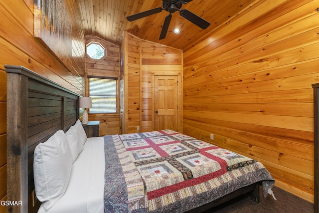 bedroom featuring lofted ceiling, ceiling fan, wooden ceiling, and wood walls