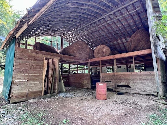 exterior space with lofted ceiling