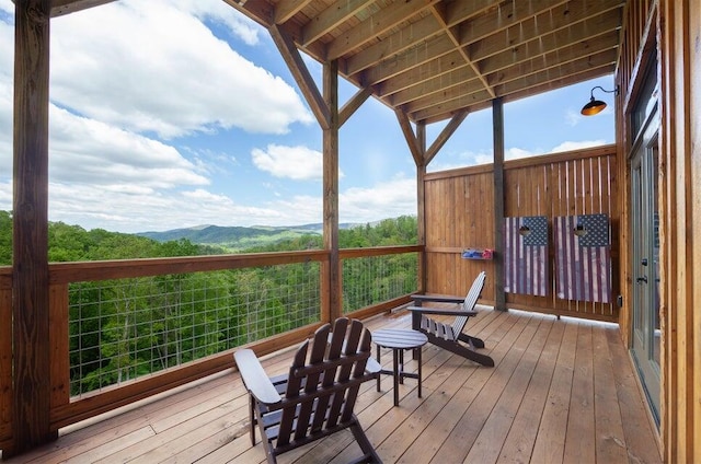 wooden terrace featuring a mountain view