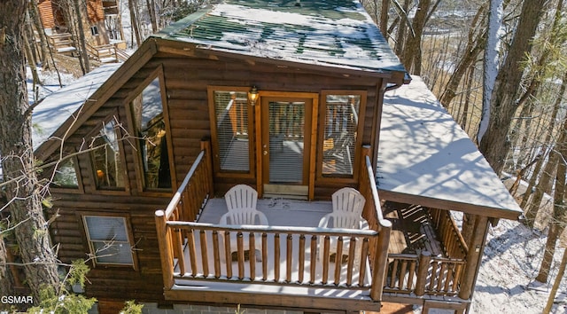 view of snow covered deck