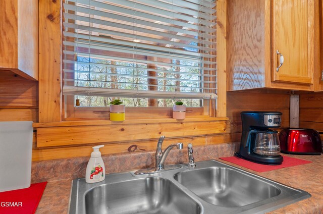 bathroom with wood ceiling, a shower with curtain, sink, toilet, and wood walls