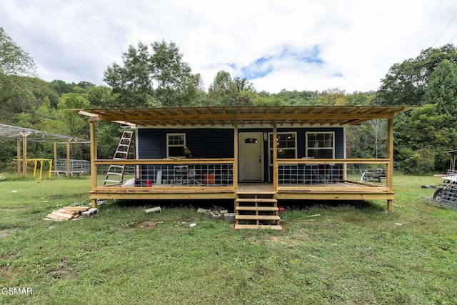 210 Adams Ln, Mooresburg, TN 37811 - view of front facade with a front yard, a pergola, and a deck