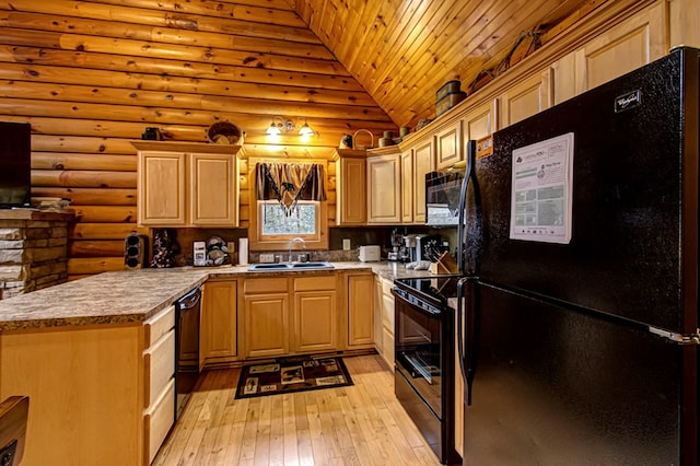 kitchen featuring sink, log walls, light brown cabinets, light hardwood / wood-style floors, and black appliances