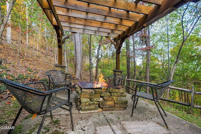 view of patio / terrace featuring a fire pit and a pergola