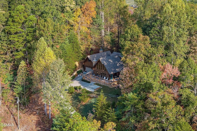 bird's eye view featuring a view of trees