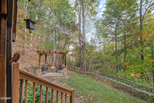 view of yard with fence and a patio