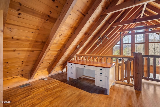 additional living space with wooden ceiling, visible vents, vaulted ceiling with beams, and wood finished floors