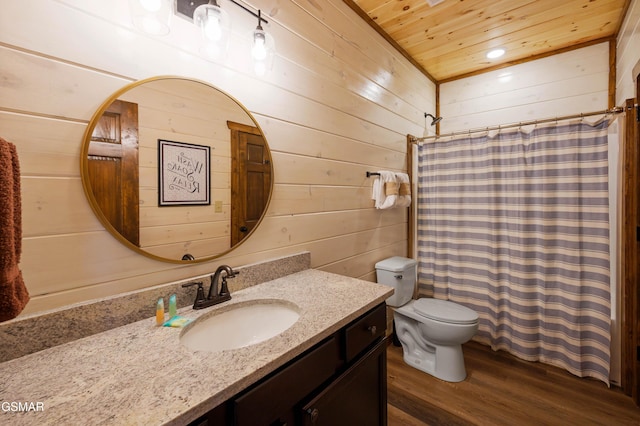 bathroom featuring toilet, wooden ceiling, vanity, wooden walls, and hardwood / wood-style floors