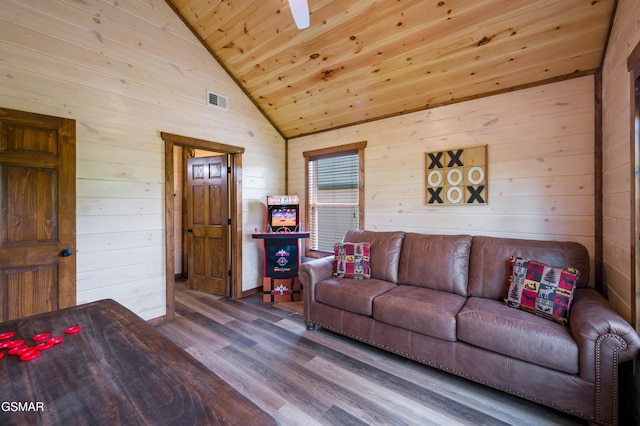 living room with hardwood / wood-style flooring, wood ceiling, lofted ceiling, and wooden walls