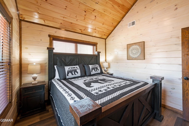 bedroom with lofted ceiling, wooden walls, wood ceiling, and dark hardwood / wood-style flooring