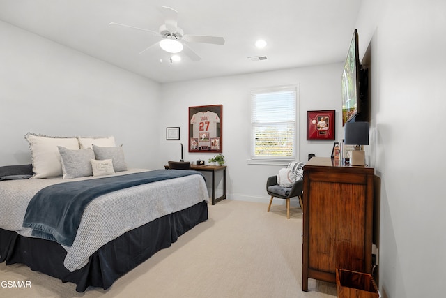 carpeted bedroom featuring ceiling fan