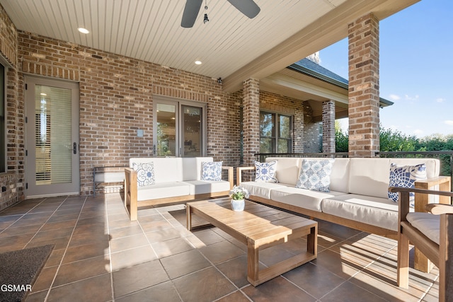 view of patio featuring an outdoor living space and ceiling fan