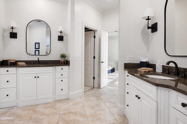 bathroom featuring tile patterned floors, vanity, and ornamental molding