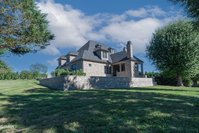 view of property exterior with a yard