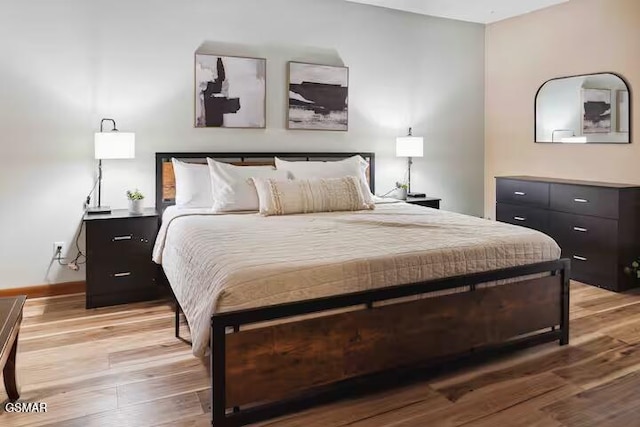 bedroom featuring light wood-type flooring