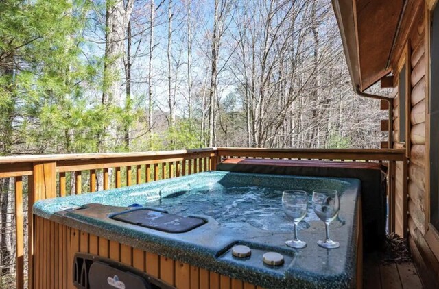 deck with a hot tub