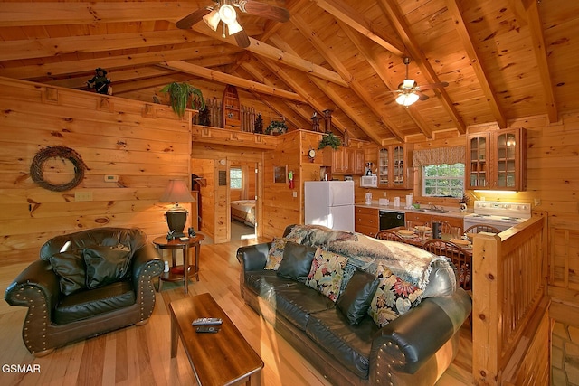 living room with wooden ceiling, ceiling fan, wooden walls, and vaulted ceiling with beams