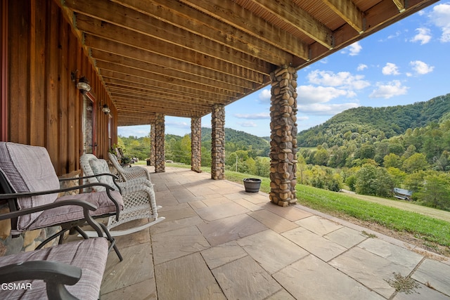 view of patio / terrace with a mountain view